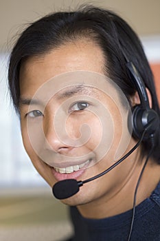 Asian man with headset