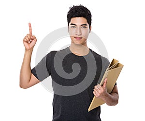 Asian man hold with folder and finger point up
