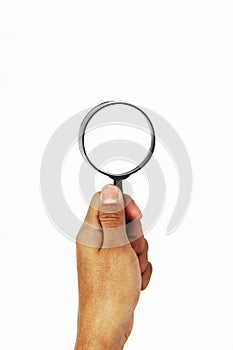 Asian man hold the magnifier glass to search thing isolated on white background.