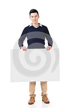 Asian man holding a blank board