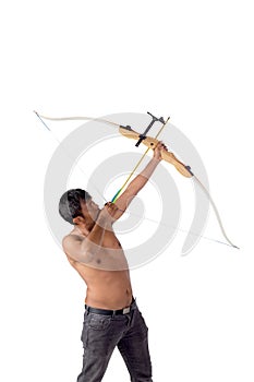 Asian man holding bow and shooting to archery target.