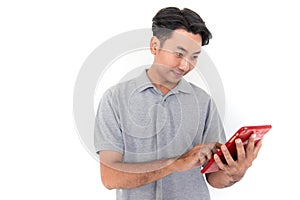 Asian man holding a tablet