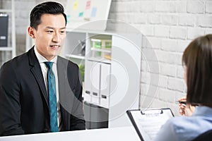 Asian man in job interview