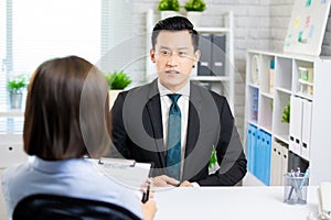 Asian man in job interview