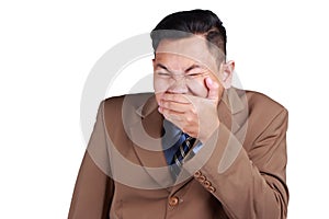 Asian Man Laughing and Covering His Mouth with Hand