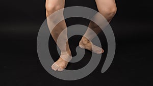 Asian Man legs and barefoot shorten is isolated on black background