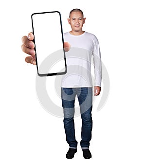 Asian man looking to camera, smiling and showing empty blank white copy space phone mock up template