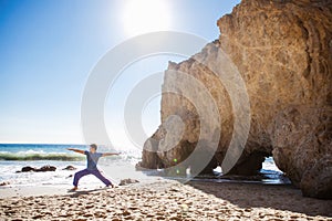 Asian man meditates in yoga position on high