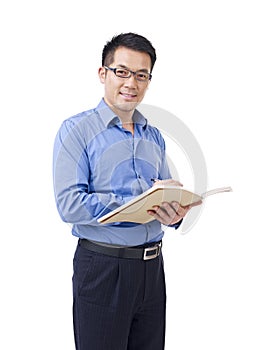 Asian man with pen and notebook