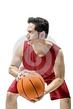 Asian man playing basketball in action