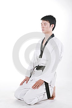 Asian man playing taekwondo