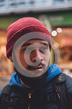 Asian Man in Red Hat Wearing Warm Winter Clothing in Dinant, Belgium