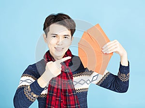 asian man showing the red envelope