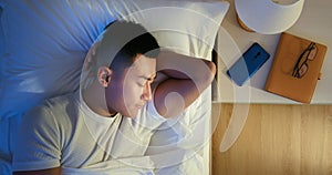 Asian man sleep well