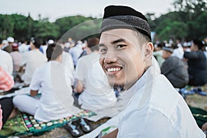 Asian man smile happily at Eid al-Fitr prayers