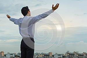 Asian man starting his morning on a to-be successful day