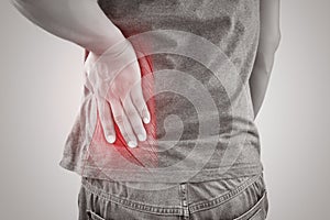 Asian man suffering from muscle waist pain injury, People with b