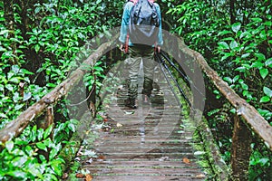 Asian man travel nature. Take a picture Nature Study in the Jungle at Chiangmai in Thailand