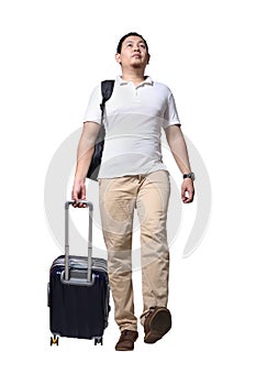 Asian man traveler walking forward drag his suitcase luggage, wearing casual shirt and backpack, full length portrait isolated on