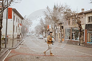 asian man walking in historical old town in istanbul