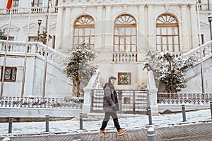 asian man walking in historical old town in istanbul