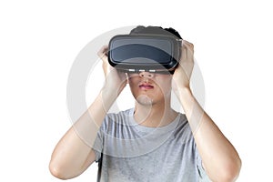 Asian man wearing VR goggle and immersing himself in VR multimedia