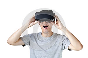 Asian man wearing VR goggle and immersing himself in VR multimedia