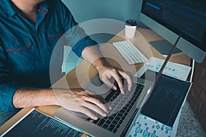 Asian man working code program developer computer web development working design software on desk in office