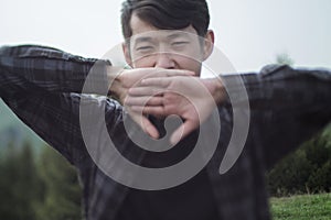 Asian man yawning photo