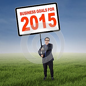 Asian manager with business goals for 2015