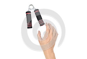 Asian manâ€™s hand gripping hand exercise gripper