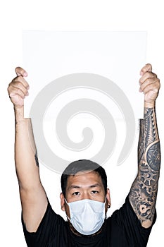 Asian men is holding cardboard in white background.The concept of protest, attention, request. Place for text or copy space.