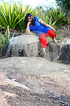 Asian Model on Rocky Terrain