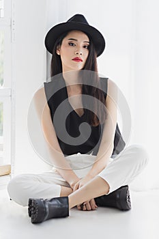 Asian model woman standing and pompous