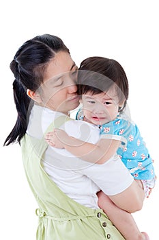 Asian mother carrying and soothe her daughter on white background