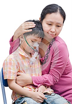 Asian mother comforts her son