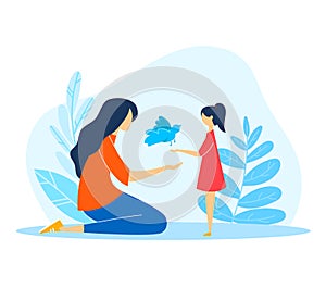 Asian mother and daughter in casual clothes playing with a blue bird outdoors. A gentle moment of familial love and care