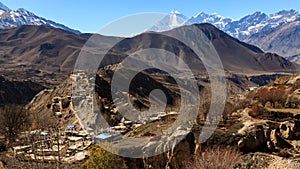 Asian mountain village and terrace fields in autumn in Lower Mustang, Nepal, Himalaya, Annapurna Conservation Area