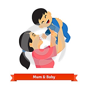 Asian mum holding up her baby in hands over head