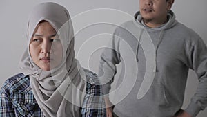 Asian muslim couple husband and wife having fight, argue and ignoring on each other, bad relationship in marriage