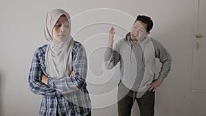 Asian muslim couple husband and wife having fight, argue and ignoring on each other, bad relationship in marriage