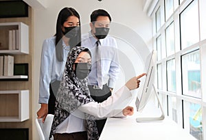 Asian Muslim female manager interviewing job