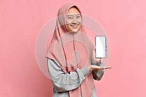 Asian muslim female showing white screen on phone