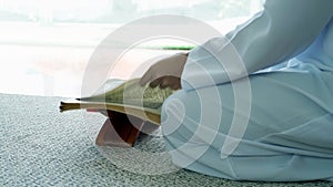 Asian Muslim Man Praying or Solat in Islam Prostration photo