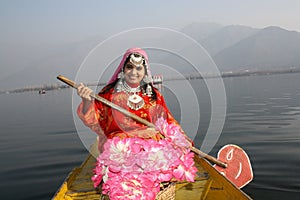 Asian Native Girl rowing a Boat