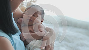 Asian, Newborn 1-month-old sleeping