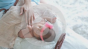 Asian, Newborn 1-month-old sleeping