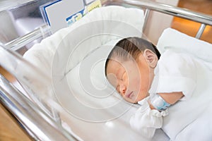 Asian newborn baby in hospital, delivery room