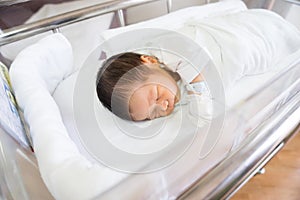 Asian newborn baby in hospital, delivery room