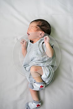 Asian newborn baby in hospital, delivery room